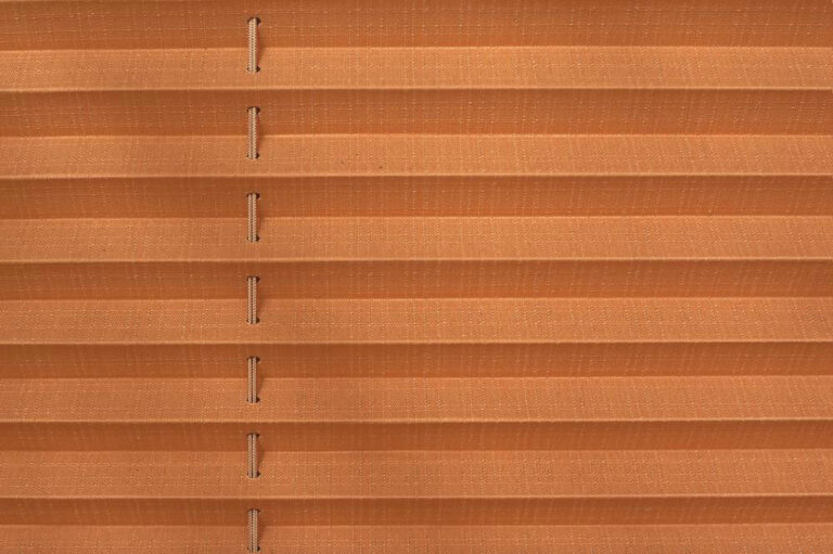 Honeycomb blinds for covering windows and other structures