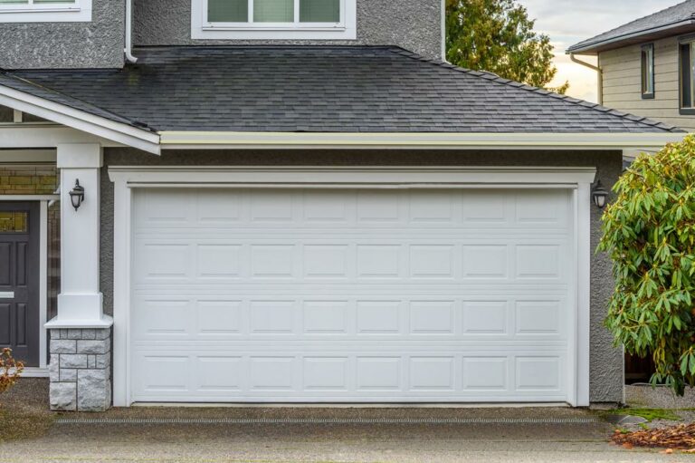 Vinyl and wooden garage door choices for modern houses